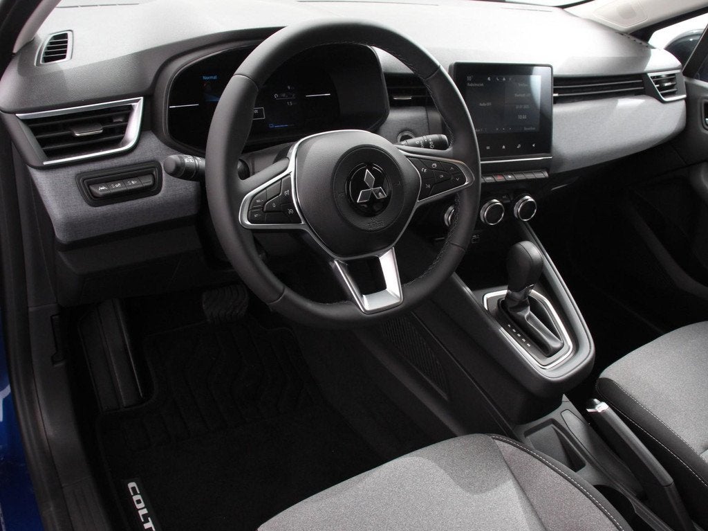 Mitsubishi Colt 1.6 HEV Automaat Intense DEMO ! Navigatie Ap, Auto's, Mitsubishi, Stof, Gebruikt, 4 cilinders, Blauw