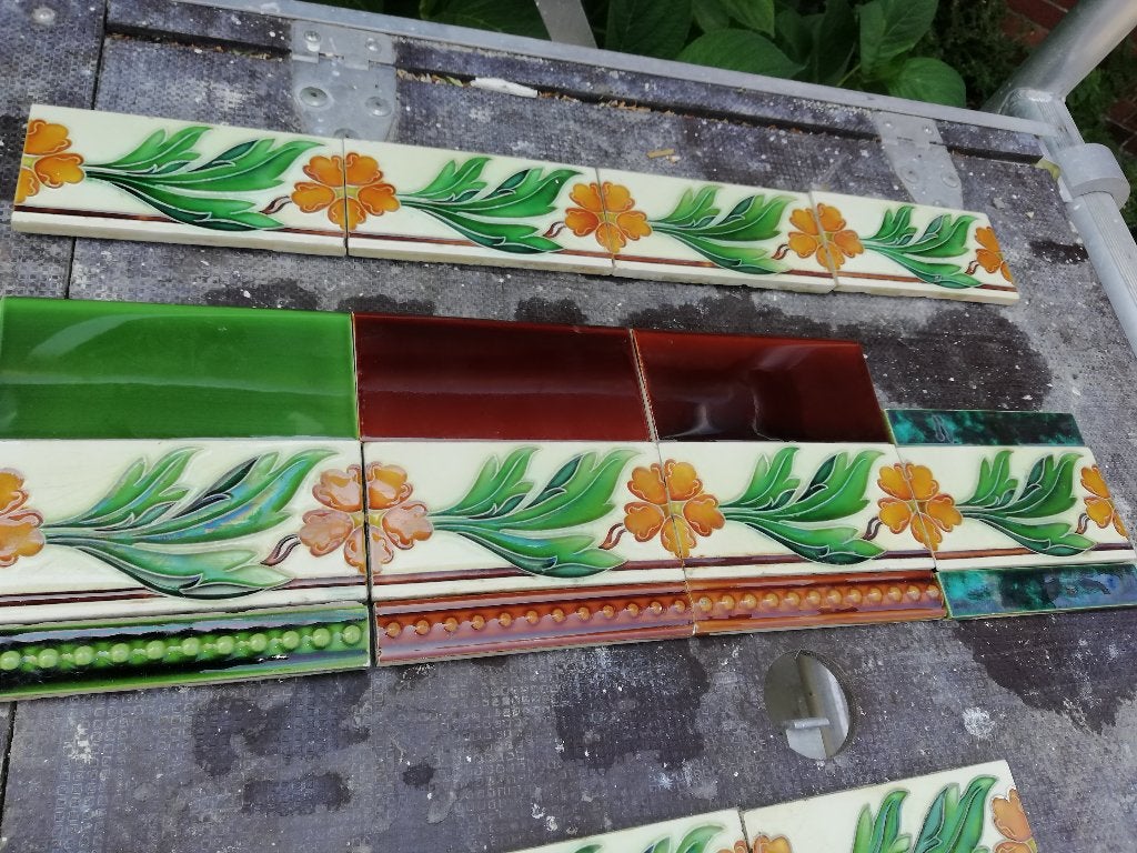 9 stuks jugendstil randtegels met opgelegd blad en bloem, Ophalen of Verzenden