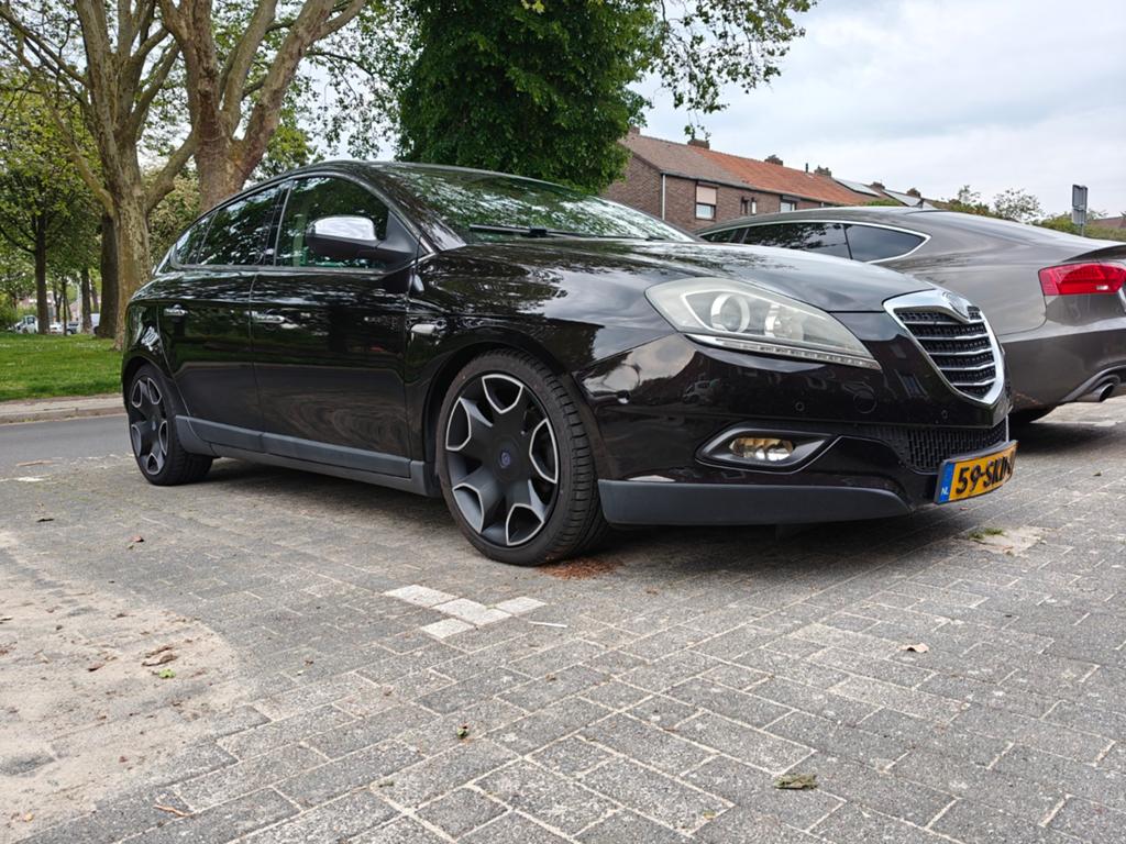 Lancia Delta 1.4 16V Multiair 2011 Zwart, Auto's, Voorwielaandrijving, Euro 5, 600 kg, 4 cilinders