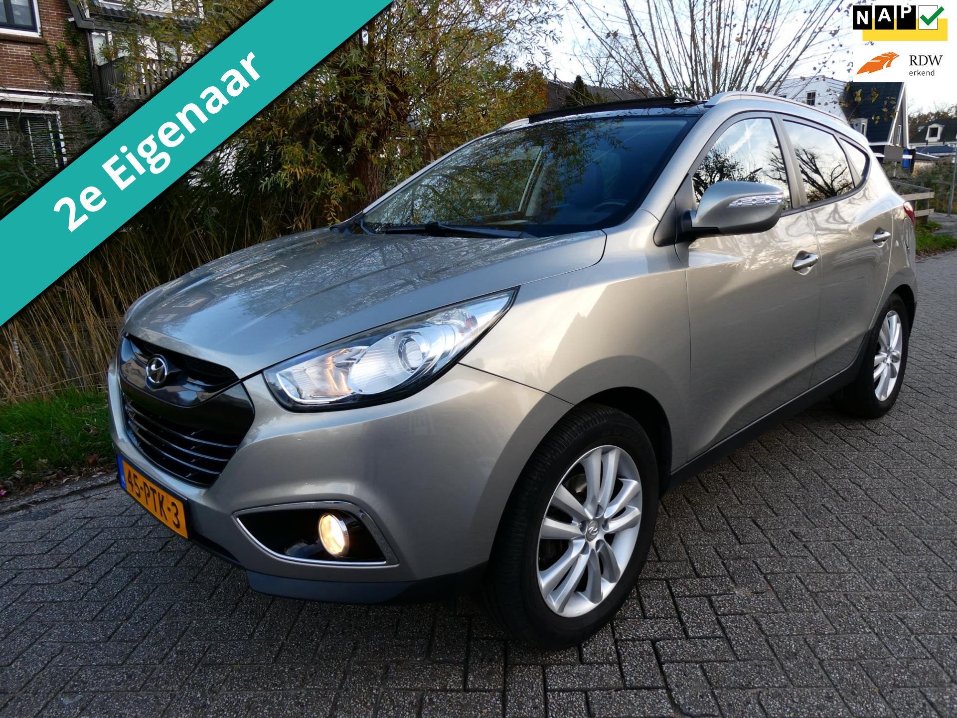 Hyundai Ix35 2.0i i-Catcher 163pk 2e eig. Clima Navi Leder T, Gebruikt, Zwart, 4 cilinders, Stoelverwarming