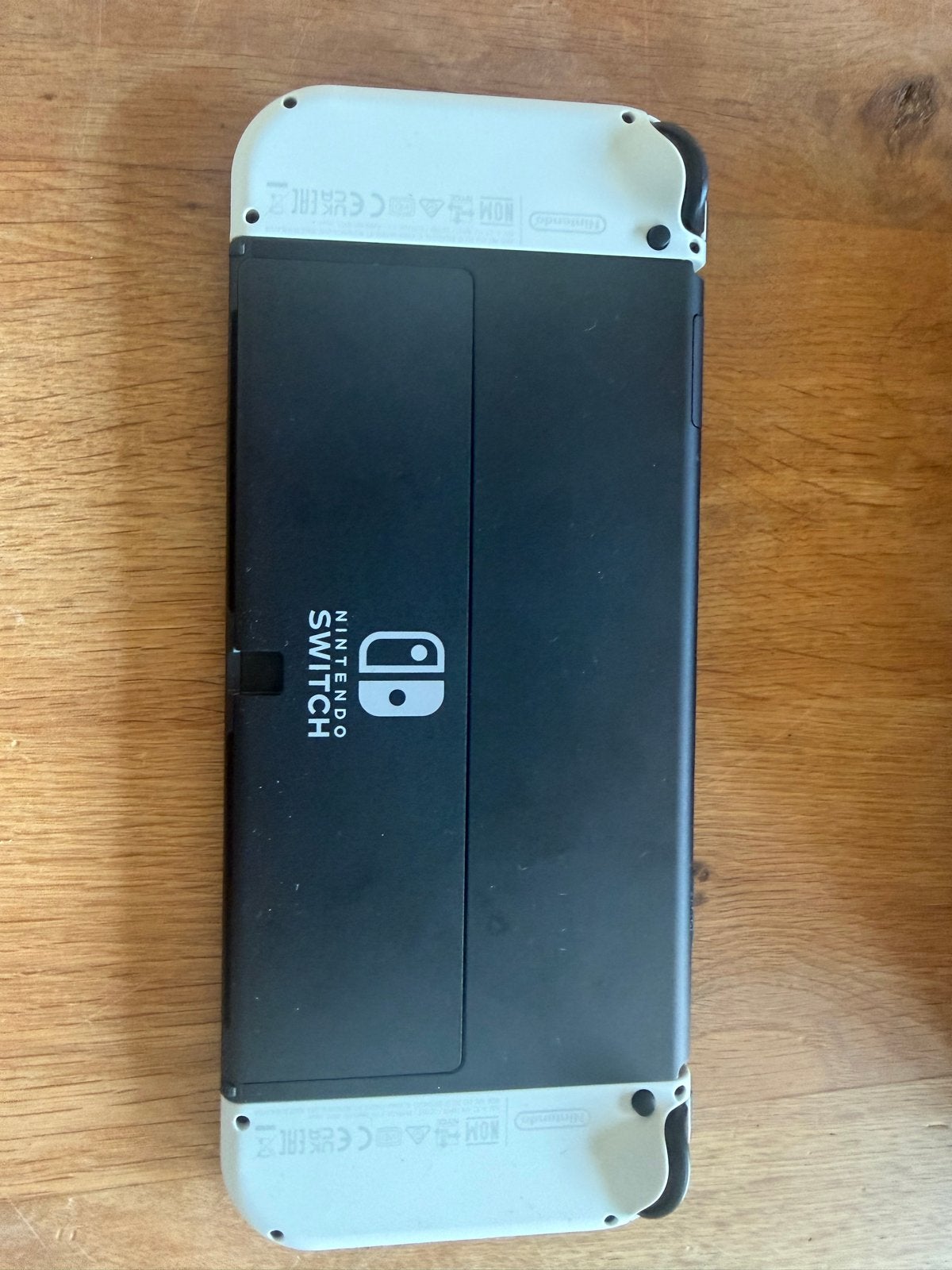 Foto 6 van Nintendo Switch OLED met 3 games en originele doos