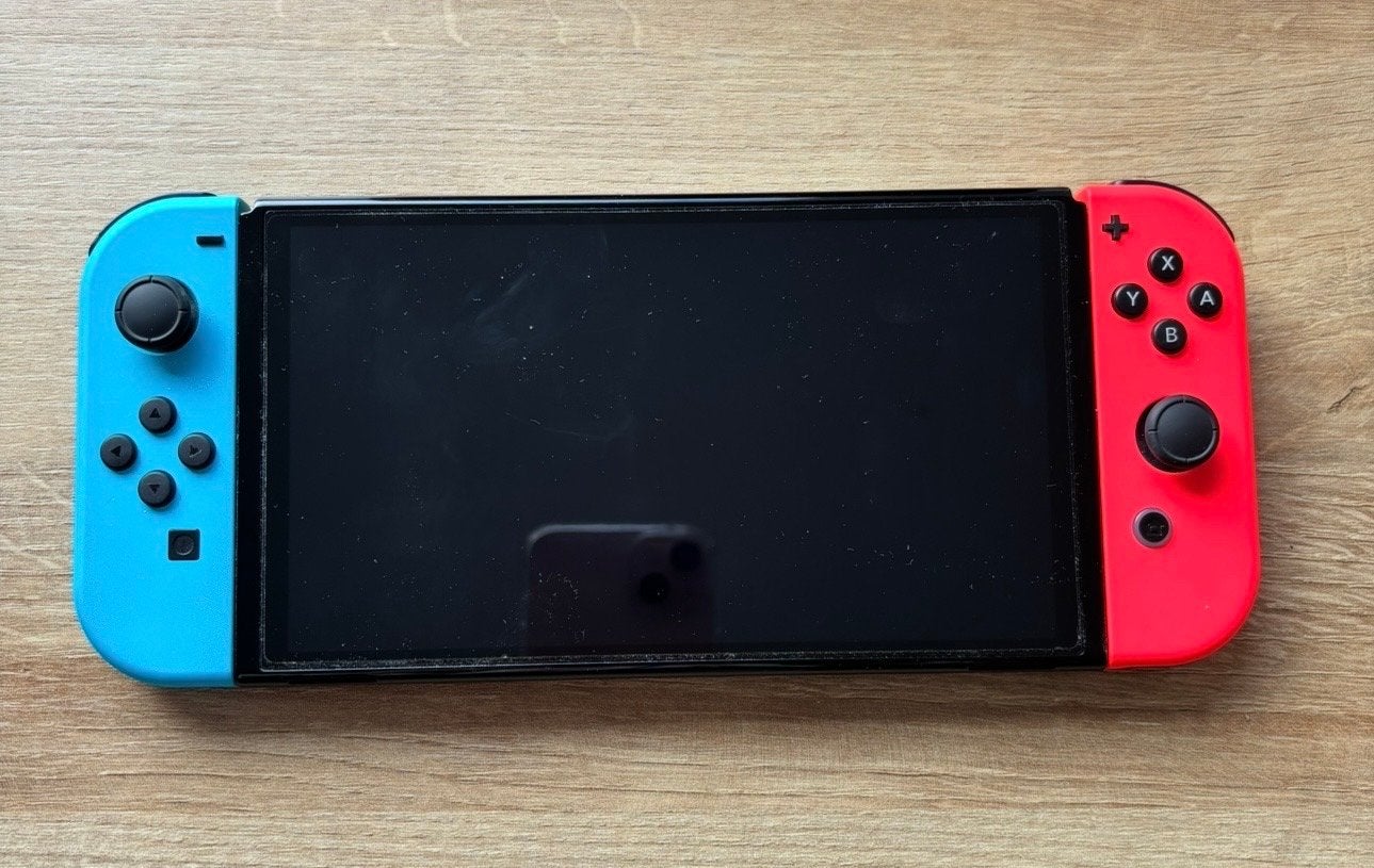 Nintendo Switch OLED + Goosebumps & Roller Coaster Tycoon, Switch OLED, Met games, Met 2 controllers, Ophalen of Verzenden