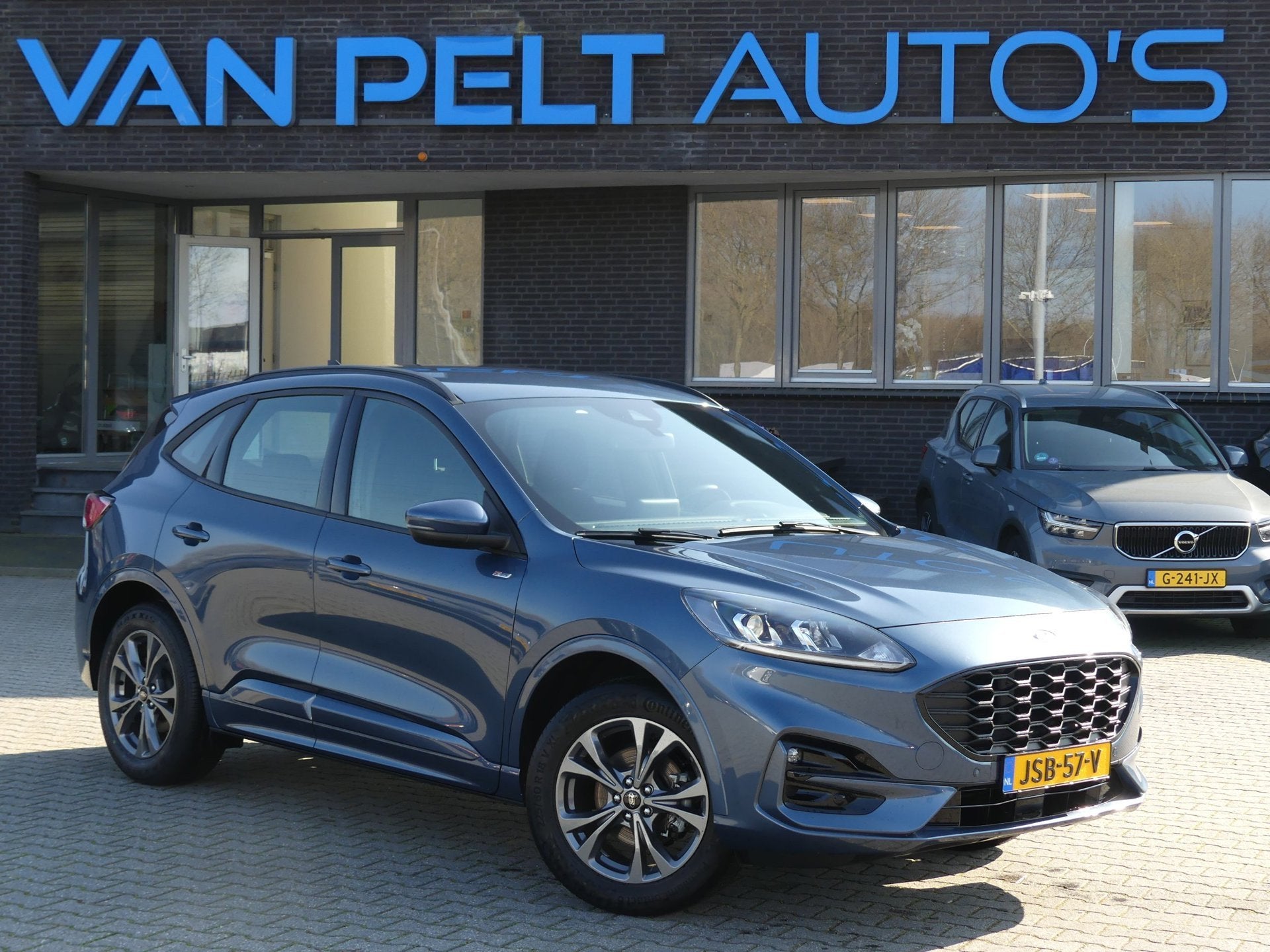 Ford KUGA 2.5 HEV Graphite ST-Line Edition Hybride, Auto's, Gebruikt, Euro 6, 4 cilinders, Blauw