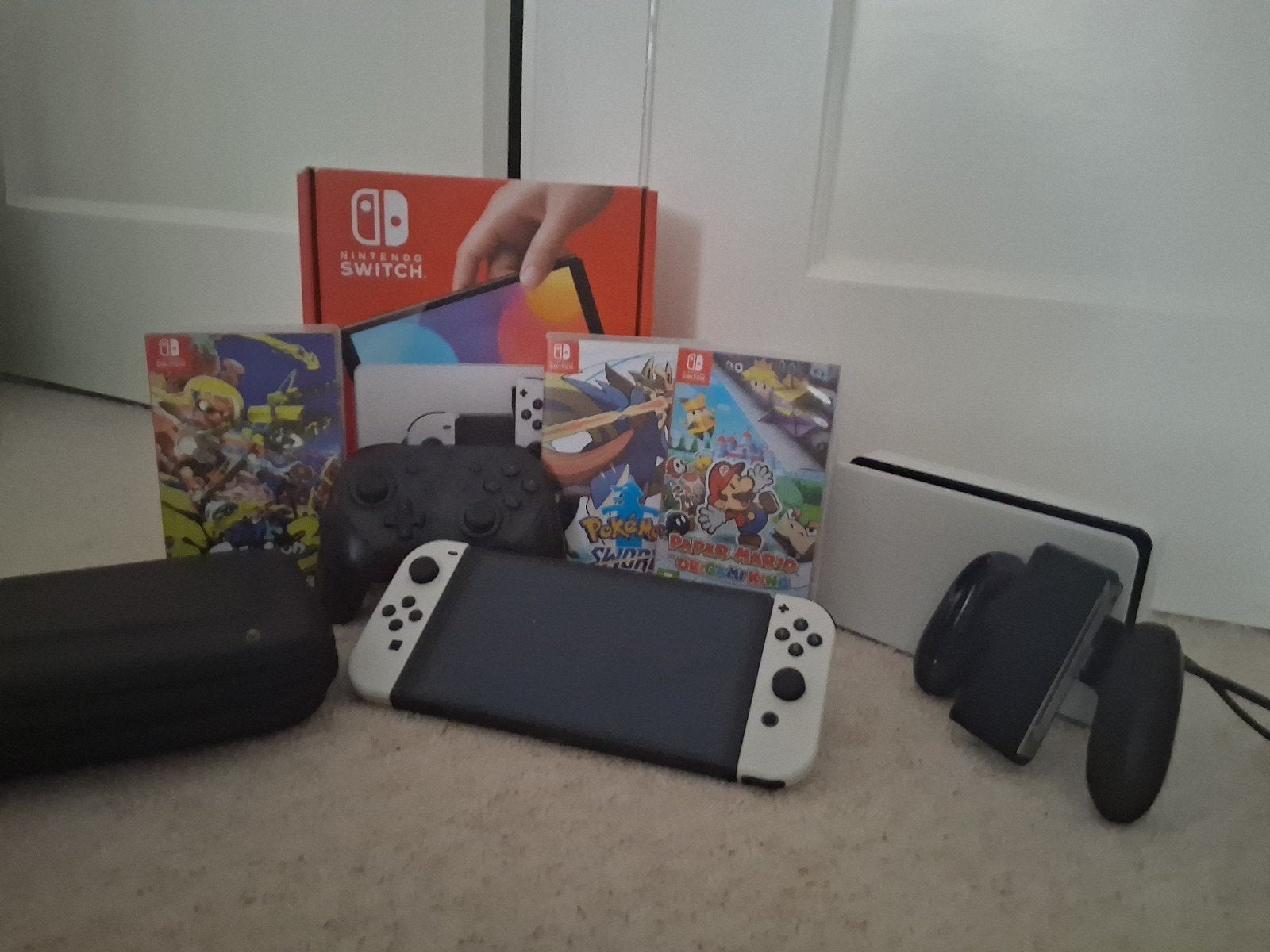 Nintendo Switch OLED Wit met 3 games en extra controller, Switch OLED, Met games, Ophalen of Verzenden, Zo goed als nieuw