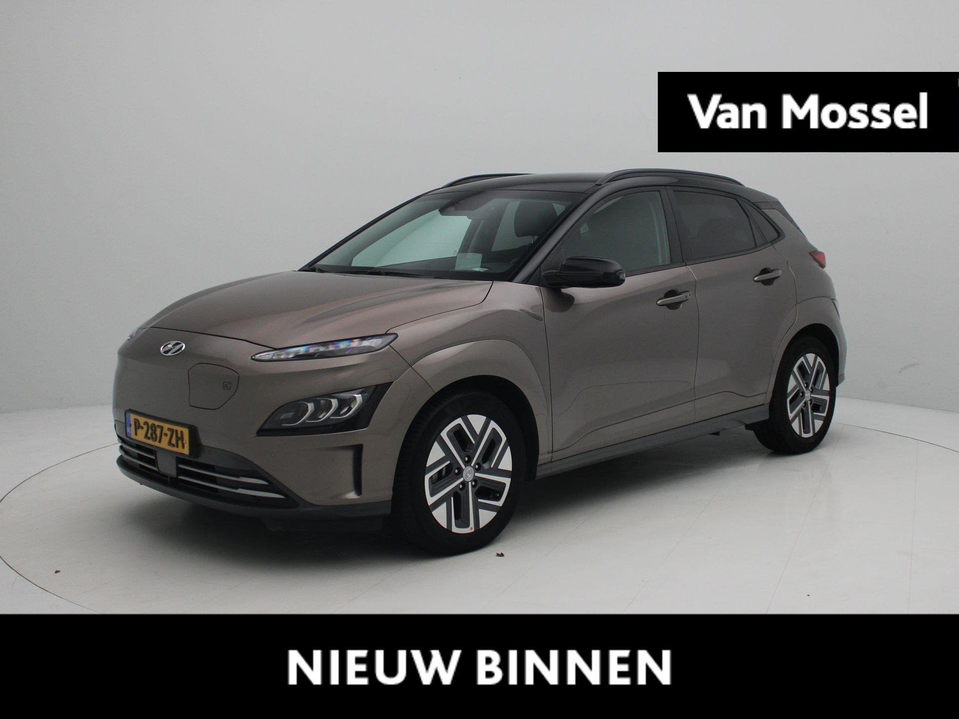 Hyundai Kona EV Premium 64 kWh | Leder | Stoelverwarming | S, Auto's, 12 maanden, Gebruikt, Origineel Nederlands, 410 min
