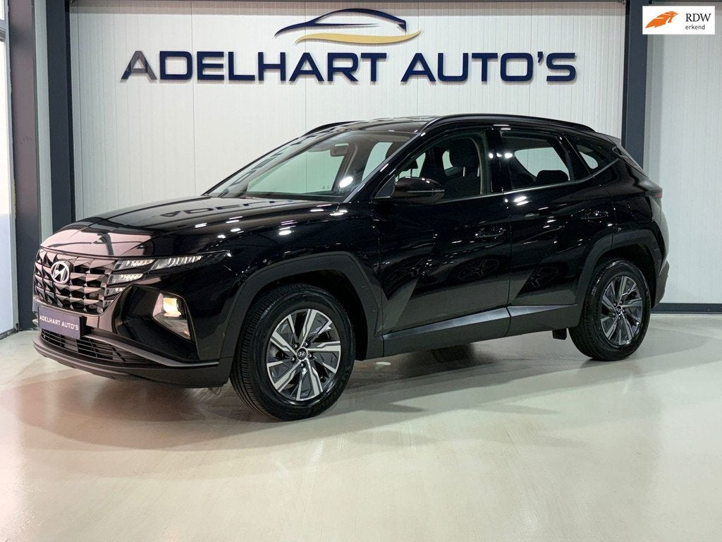Hyundai Tucson 1.6 T-GDI HEV Comfort 230 PK Automaat / Navig, Auto's, Hyundai, Bedrijf, Te koop, Tucson, ABS, Achteruitrijcamera