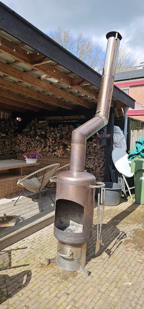 HoutKachel met pijp en bbq, Ophalen