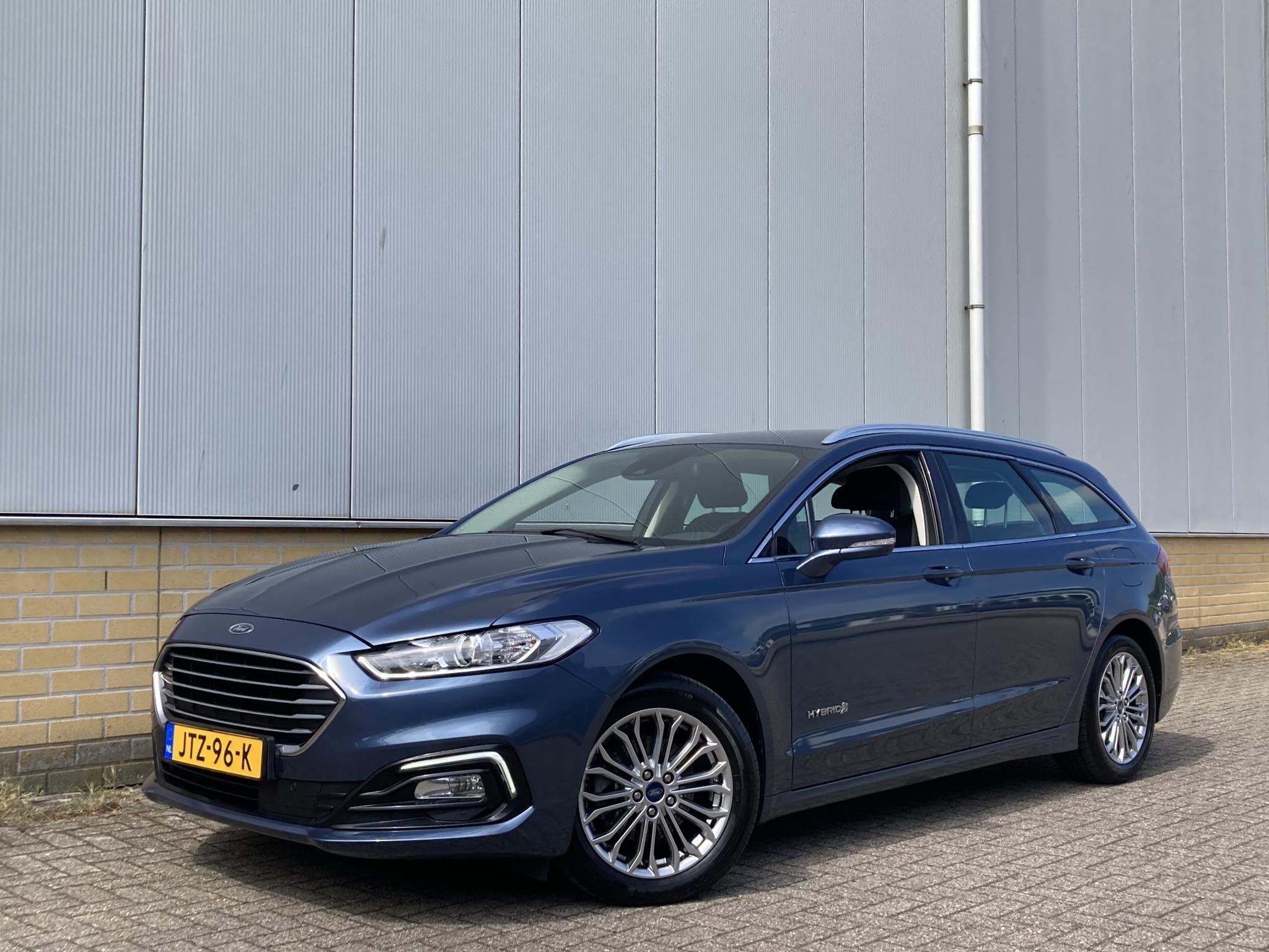 Ford Mondeo 2.0 Hybrid 187 pk Titanium Wagon AGR bestuurders, Auto's, Ford, 188 pk, Stof, Gebruikt, 4 cilinders