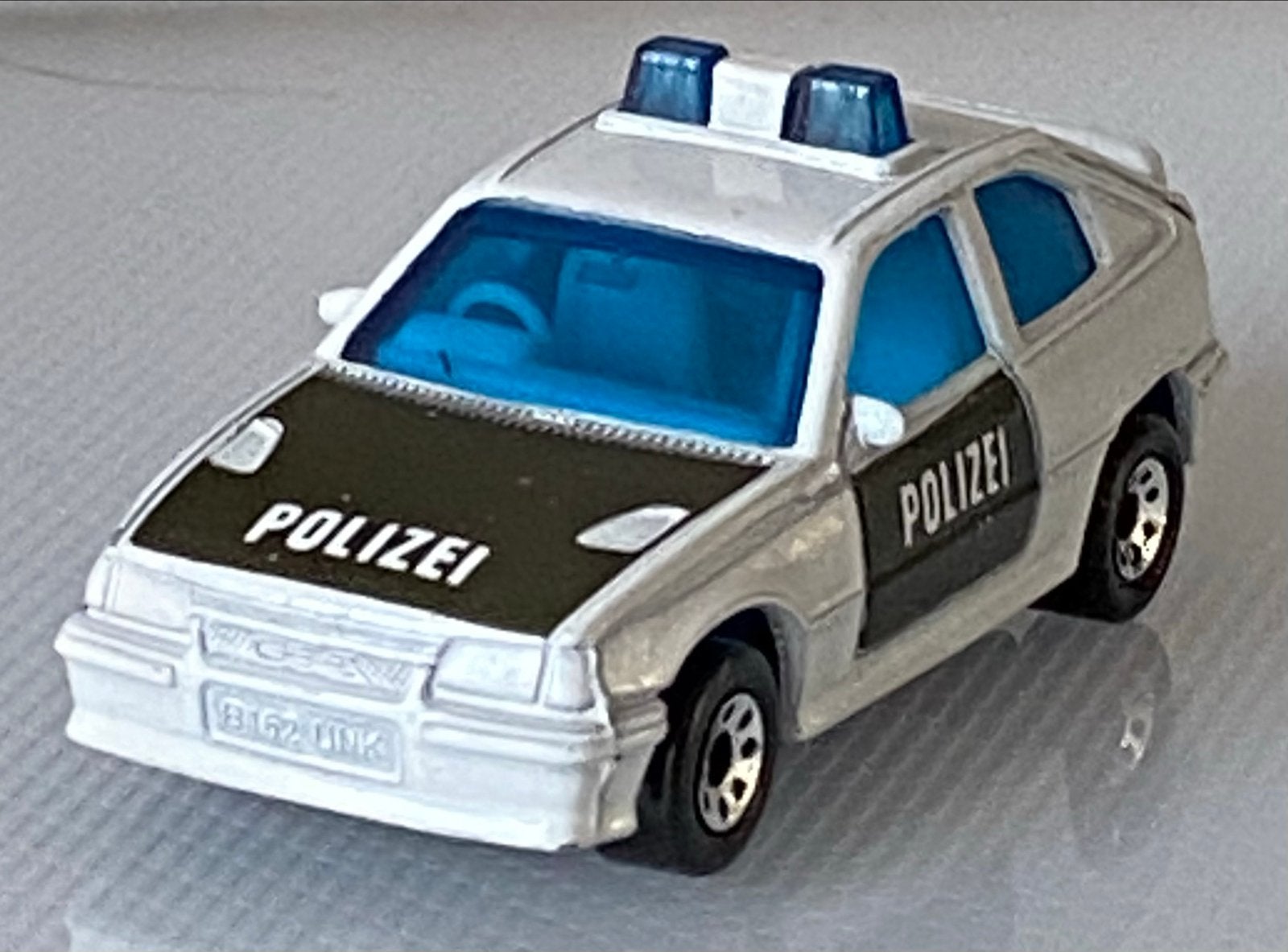 Matchbox Opel Kadett E GSi Politie 1:50 Nieuwstaat, Ophalen of Verzenden, Nieuw, Auto, Matchbox