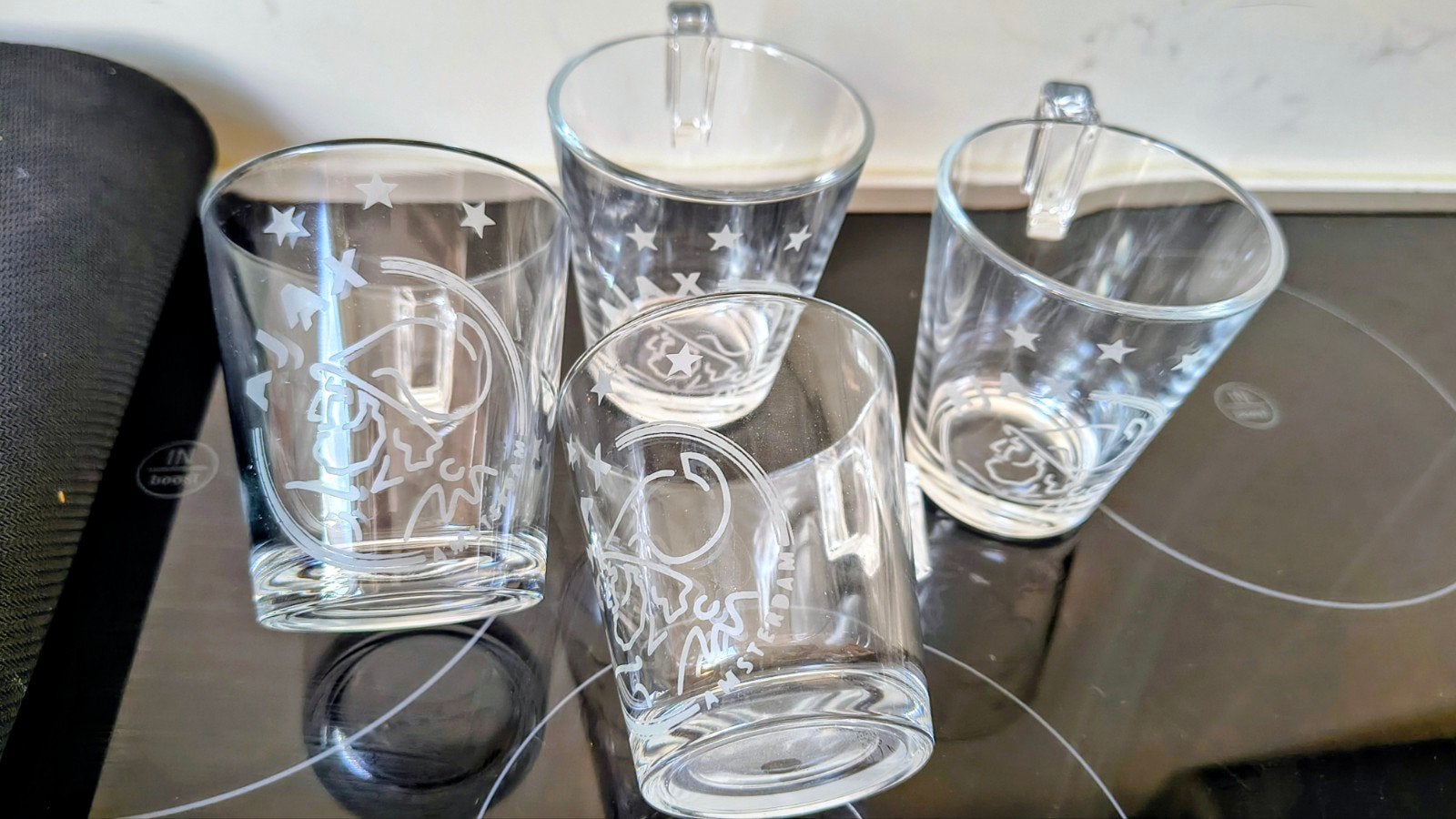 Set van 4 glazen koppen met Ajax-logo, Overige typen, Ophalen of Verzenden, Zo goed als nieuw, Glas