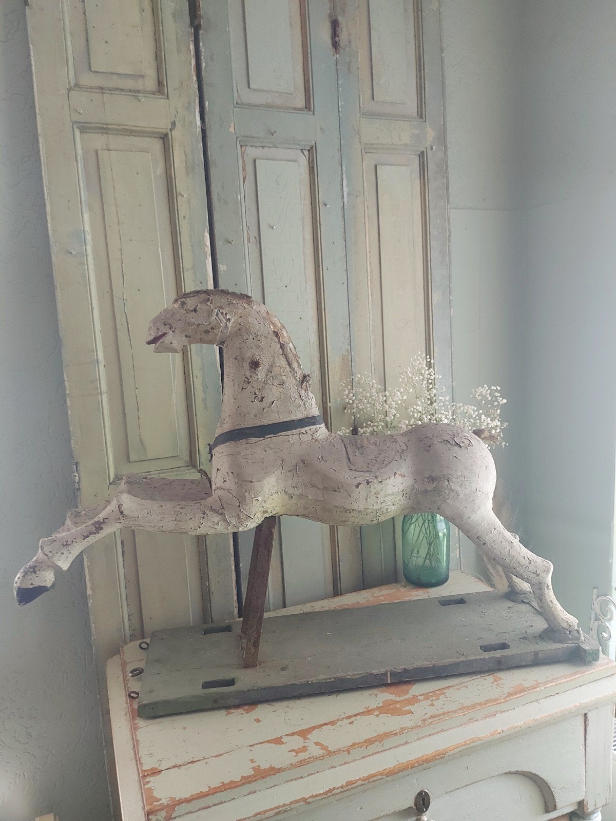 Antiek houten carrousel paard, Ophalen