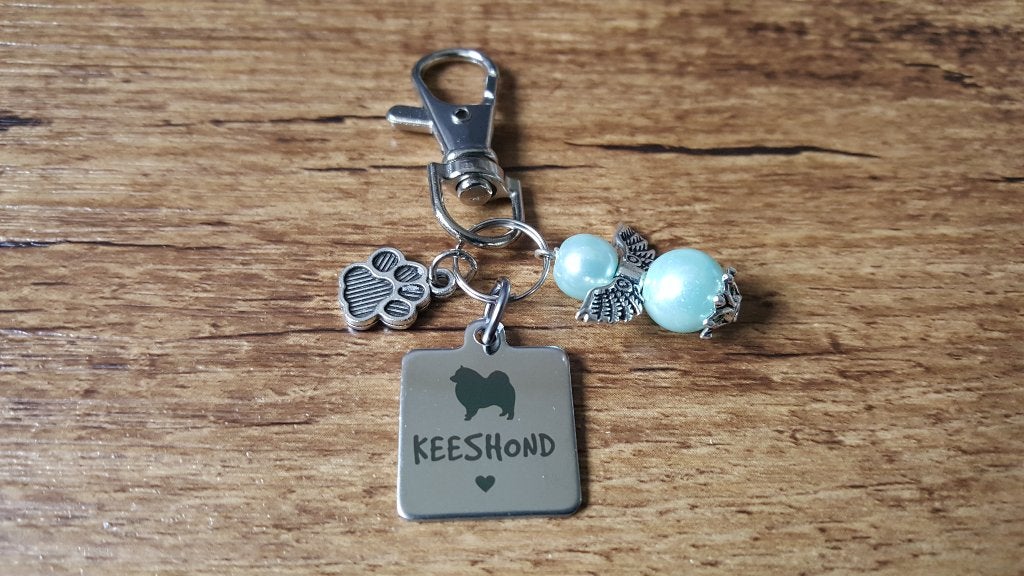 Tas/Sleutelhanger Keeshond RVS met beschermengeltje, Verzenden, Nieuw