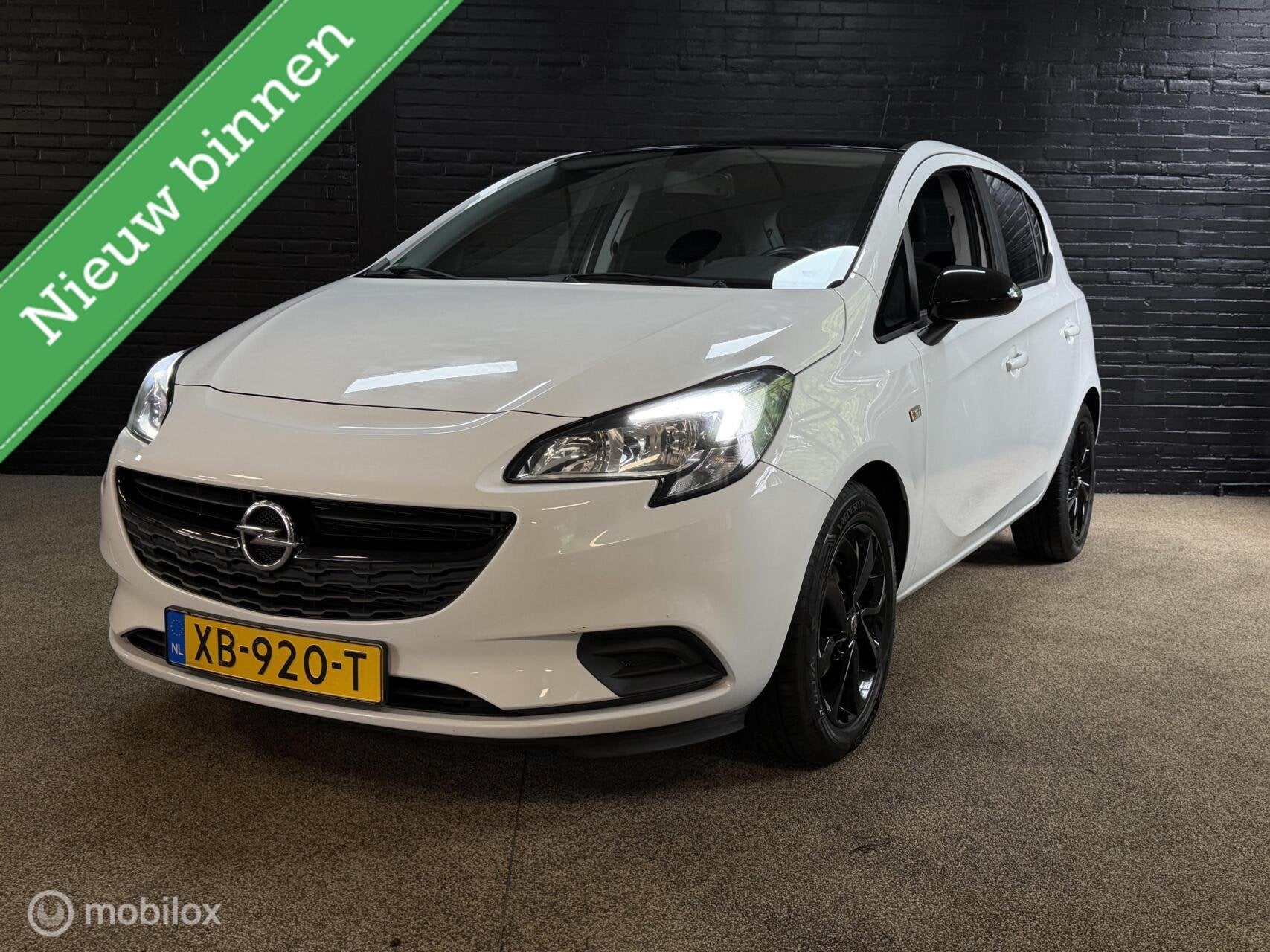 Opel Corsa 1.4 Black Edition NAVIGATIE VELGEN CRUISE PDC NAP, Auto's, Opel, 1063 kg, Gebruikt, 4 cilinders, Origineel Nederlands