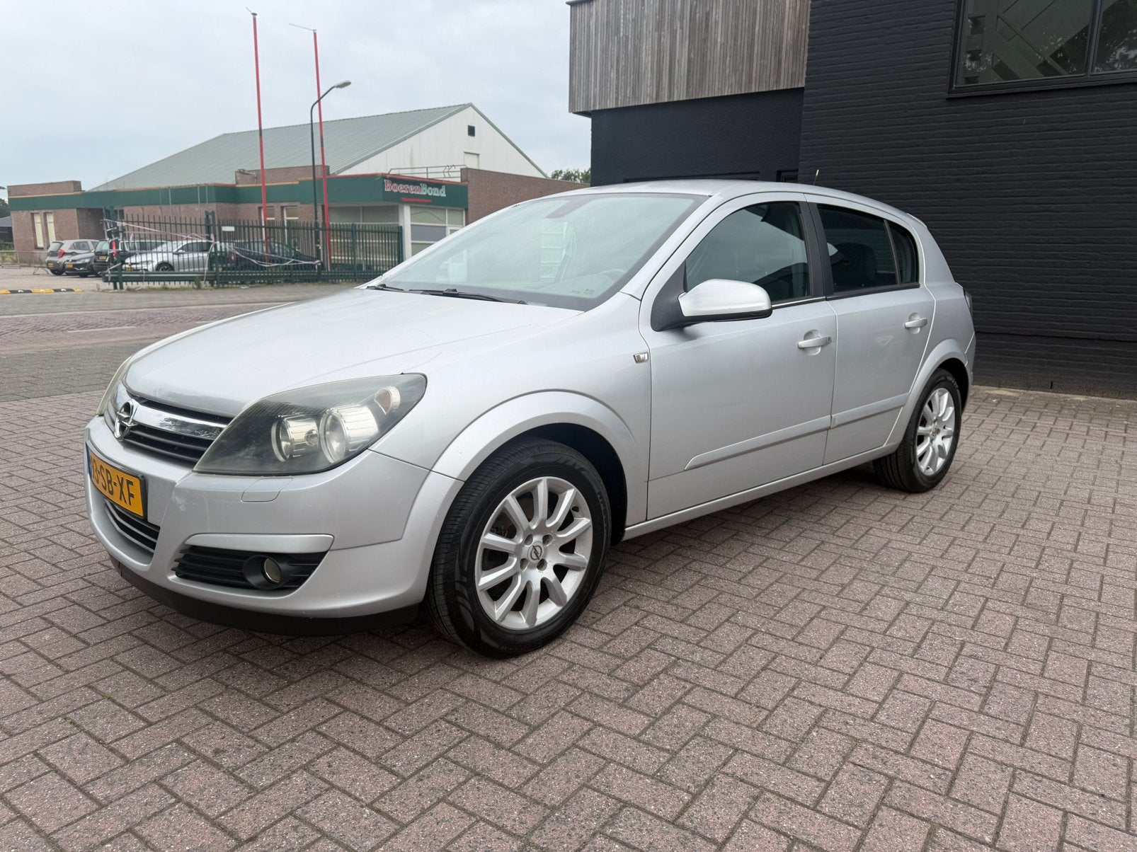 Opel Astra 1.6 16V 5D 77KW 2005 Grijs, Auto's, Voorwielaandrijving, 4 cilinders, 1165 kg, Origineel Nederlands