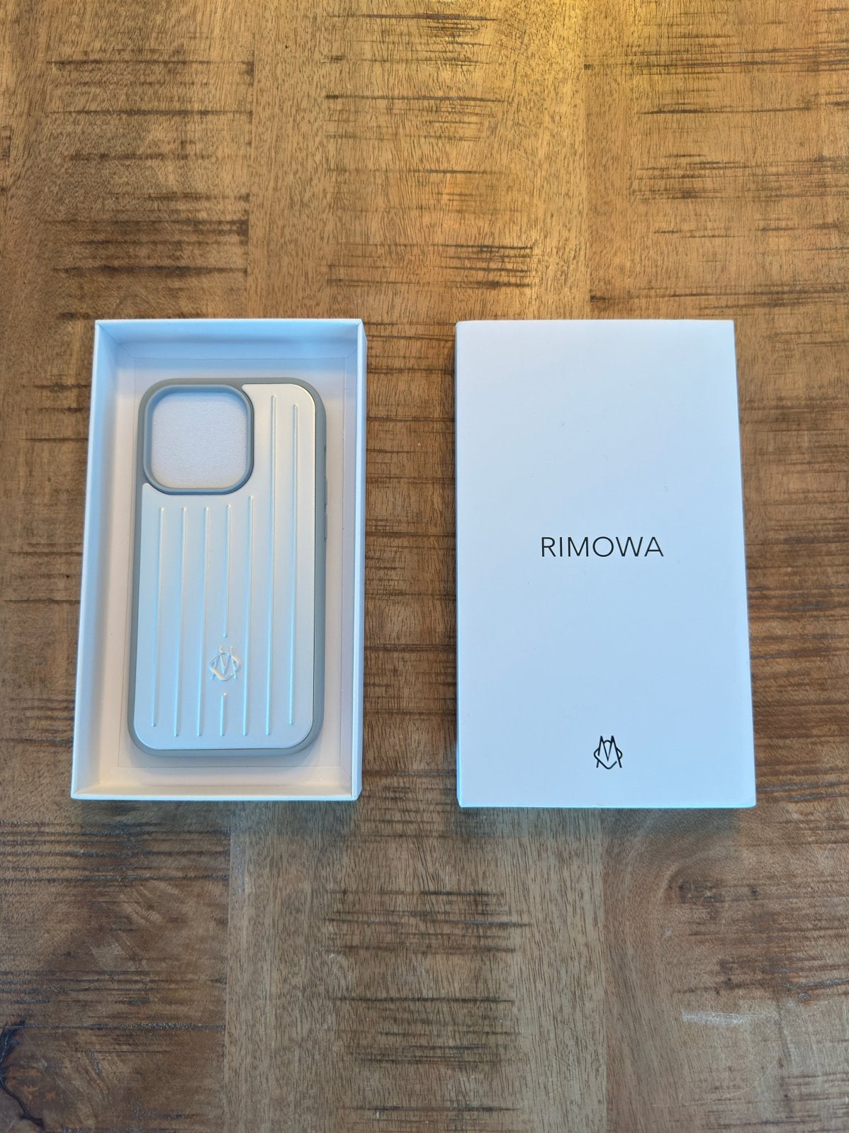 Rimowa telefoonhoesje voor iPhone 14 Pro - Zo goed als nieuw, Telecommunicatie, IPhone 14 Pro, Hoesje of Tasje, Ophalen of Verzenden
