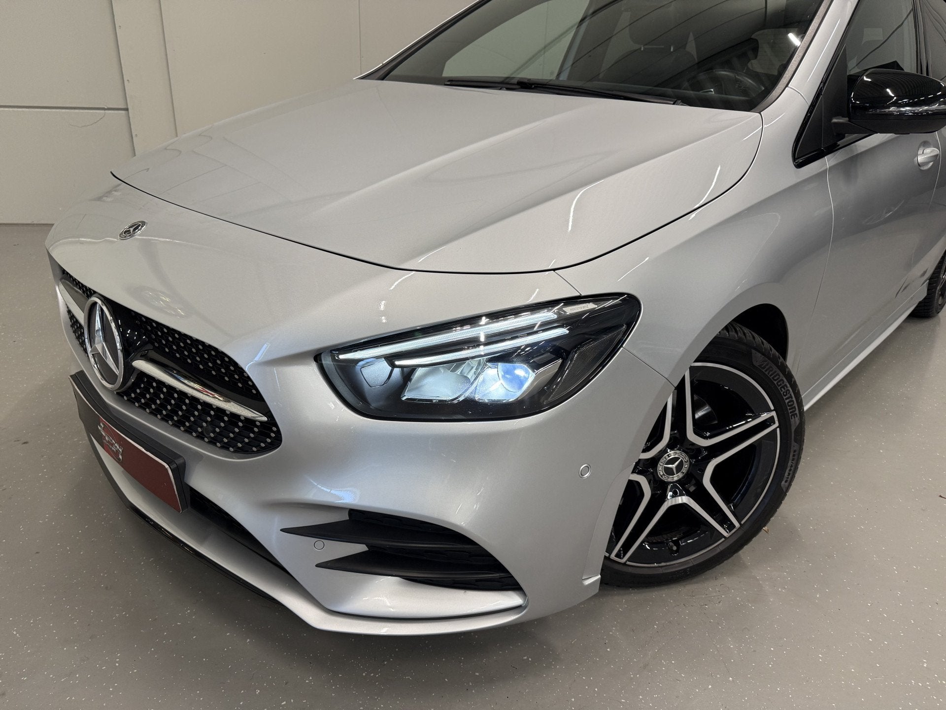 Mercedes-Benz B-Klasse 200 AMG aut. 58.889KM/PANO/TREKHAAK/M, Dealer onderhouden, Gebruikt, Zwart, 4 cilinders