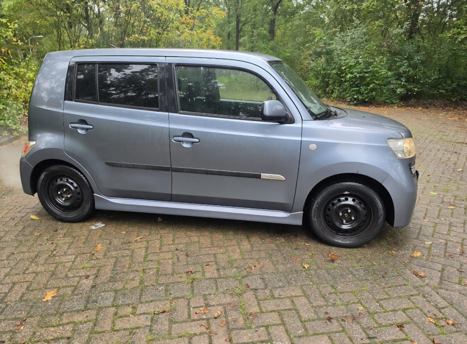 Daihatsu Materia 1.3 2007 Grijs, Auto's, Voorwielaandrijving, 15 km/l, 40 €/maand, 4 cilinders