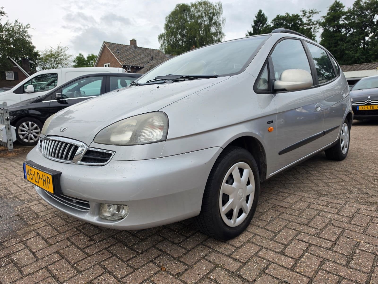 Daewoo Tacuma 1.6-16V Style, Auto's, Daewoo, Voorwielaandrijving, Stof, Gebruikt, Zwart
