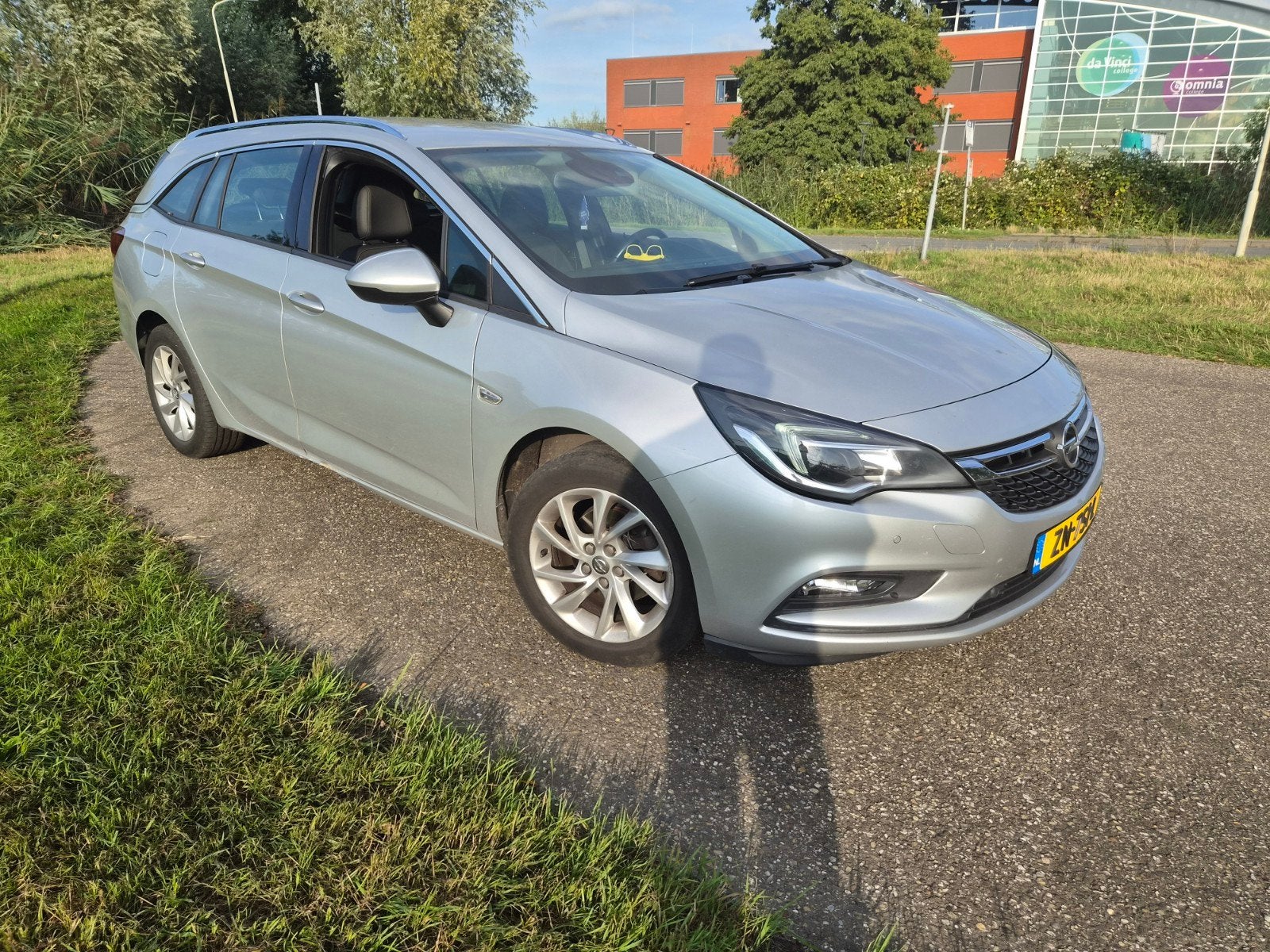 Opel Astra 1.4 Turbo 150pk Start/stop 2019 Grijs +trekhaak, Auto's, Voorwielaandrijving, 15 km/l, Origineel Nederlands, Stationwagon