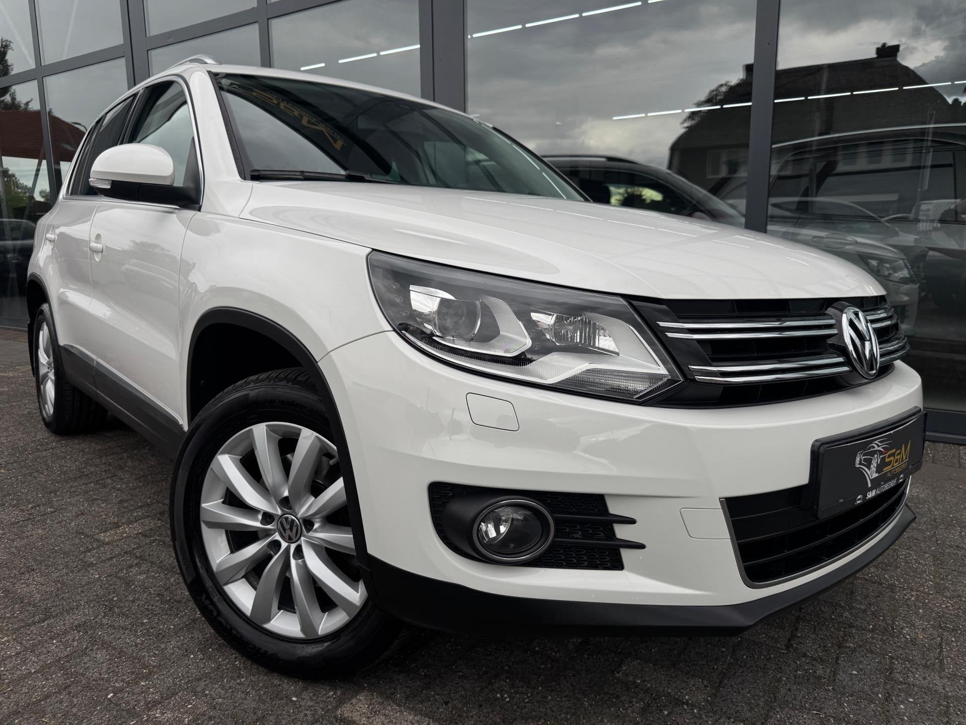 Volkswagen Tiguan 2.0 TSI Sport&Style 4Motion | Pano., Dealer onderhouden, Gebruikt, Zwart, 4 cilinders