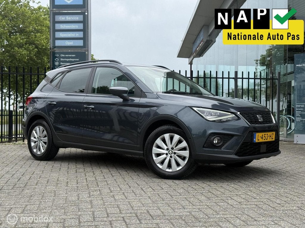 Seat Arona 1.0 TSI Business | Leer | Camera | ACC | Virtual, Auto's, Voorwielaandrijving, Gebruikt, Met garantie (alle), Automatische klimaatregeling