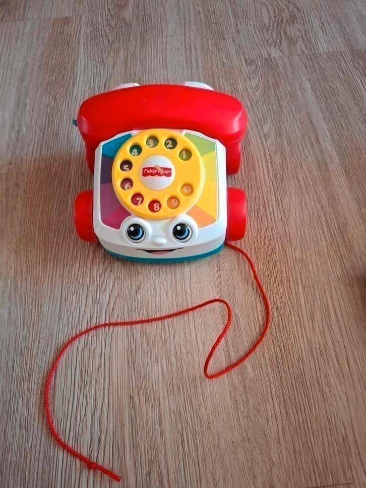 Kleurrijke fisher price telefoon met trektouwtje., Kinderen en Baby's, Speelgoed | Fisher-Price, Ophalen of Verzenden, Zo goed als nieuw