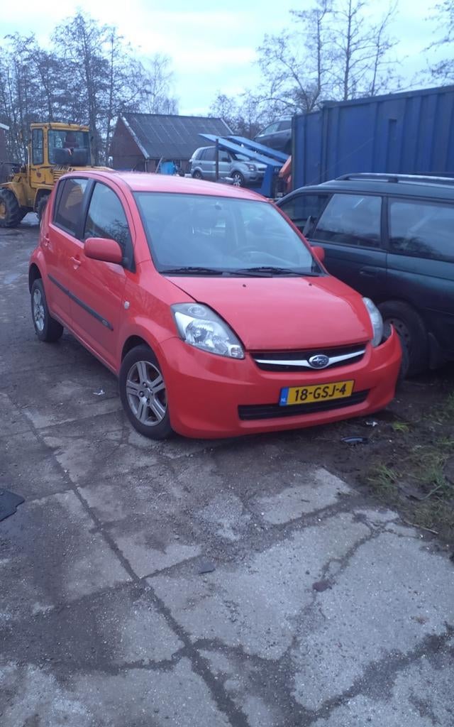 subaru Justy daihatsu sirion 1.3 rood onderdelen verkoop, Gebruikt, Voor, Ophalen of Verzenden, Spatbord