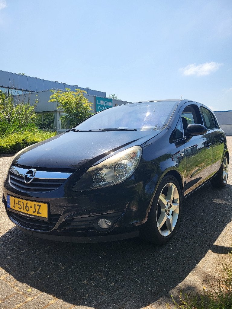 Opel Corsa 1.2 16V 5D 2007 Zwart, Auto's, Voorwielaandrijving, 4 cilinders, 1229 cc, Handgeschakeld