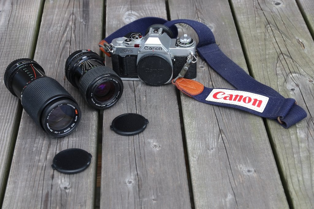 Canon AE1 analoge camera met Sigma en Panagor zoomlens, Ophalen of Verzenden, Gebruikt, Spiegelreflex, Canon