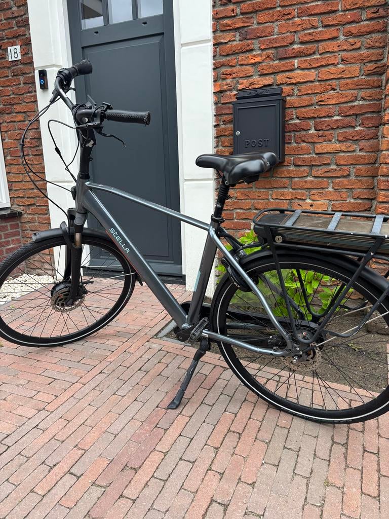 Stella Livorno elektrische herenfiets, Gebruikt, 51 tot 55 cm, 30 tot 50 km per accu, Ophalen