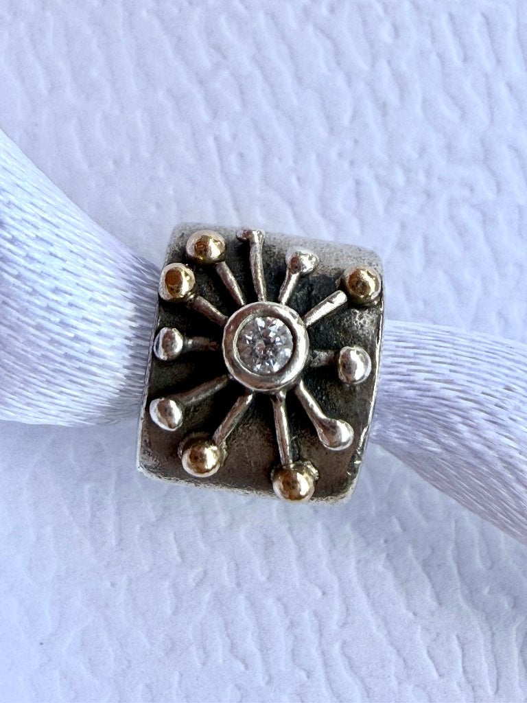 Pandora bedel Starburst zilver met goud, Overige merken, Ophalen of Verzenden, Zo goed als nieuw, 1 bedel
