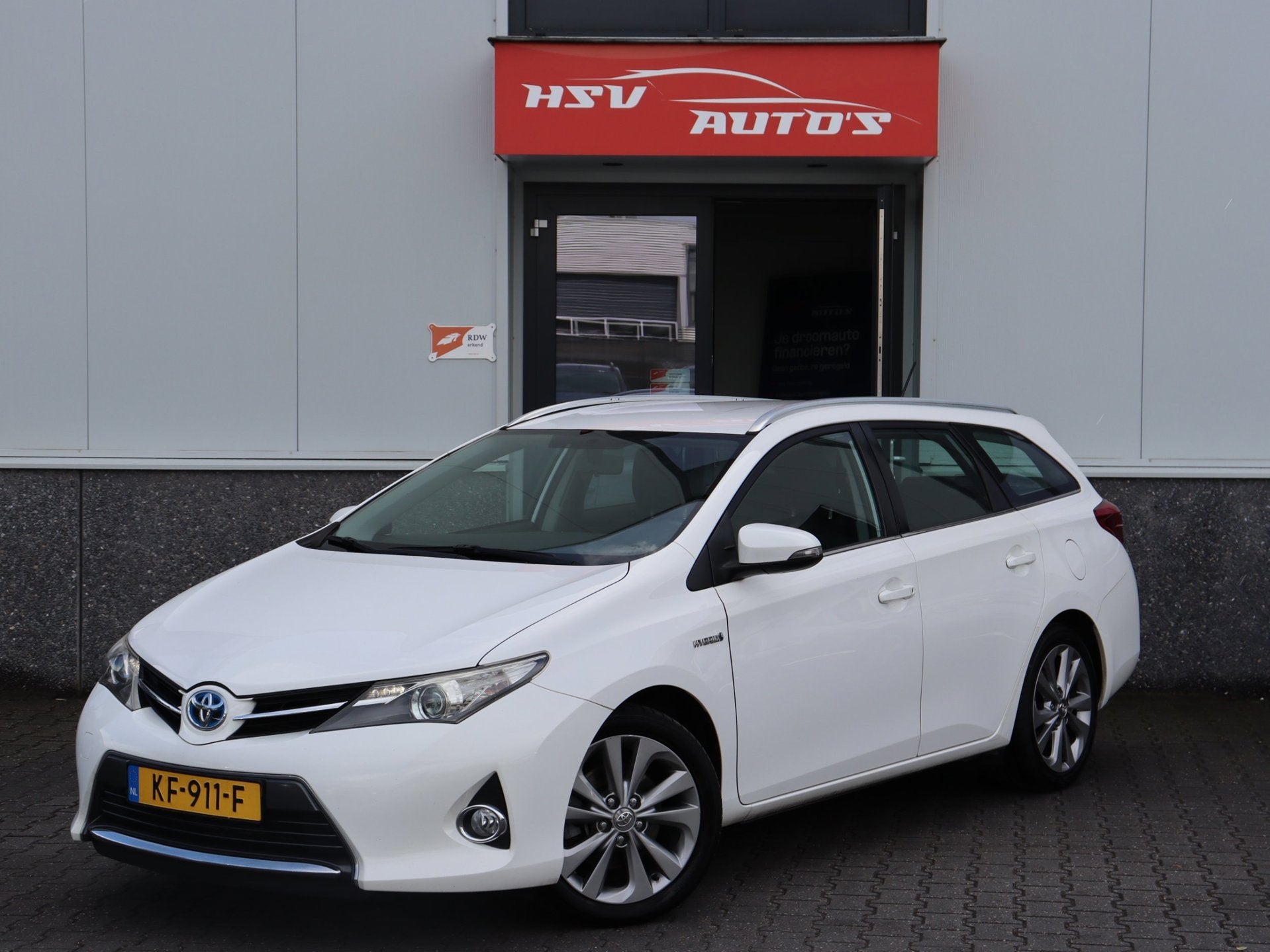 Toyota Auris Touring Sports 1.8 Hybrid Lease navi LM airco, Euro 5, Gebruikt, Wit, 25 km/l