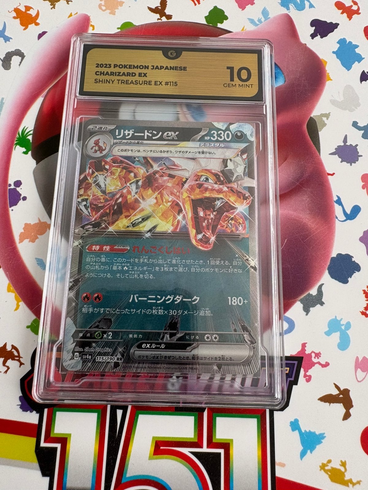 Charizard ex shiny treasures grade 10, Ophalen of Verzenden, Zo goed als nieuw, Meerdere kaarten, Foil