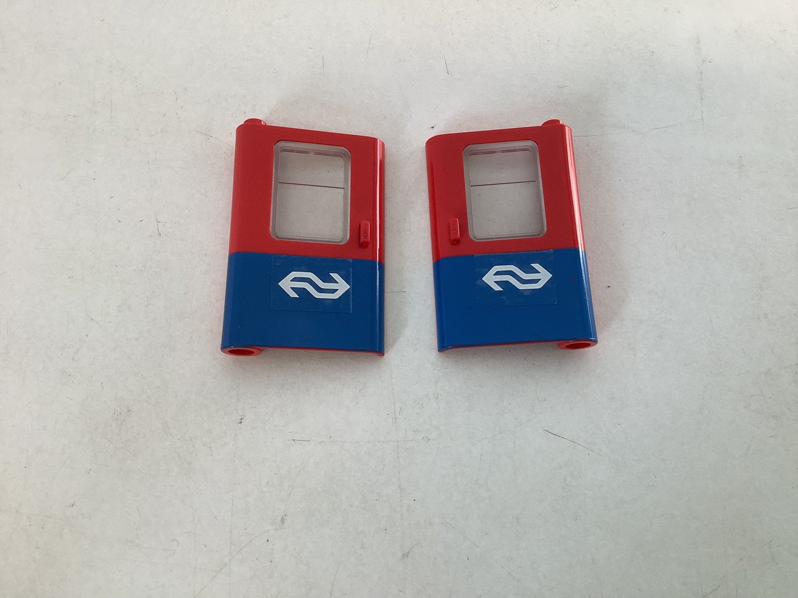 Lego trein deur 1x4x5 rood onderzijde blauw met sticker NS, Ophalen of Verzenden, Gebruikt, Losse stenen, Lego