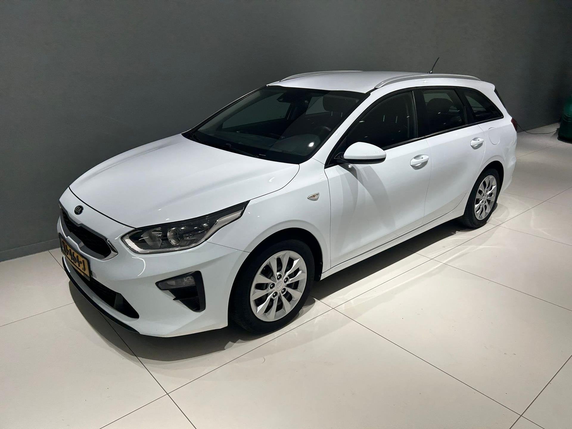 Kia Ceed Sw 1.0 T-GDi 120pk ComfortLine, Auto's, 12 maanden, Stof, Gebruikt, Wit