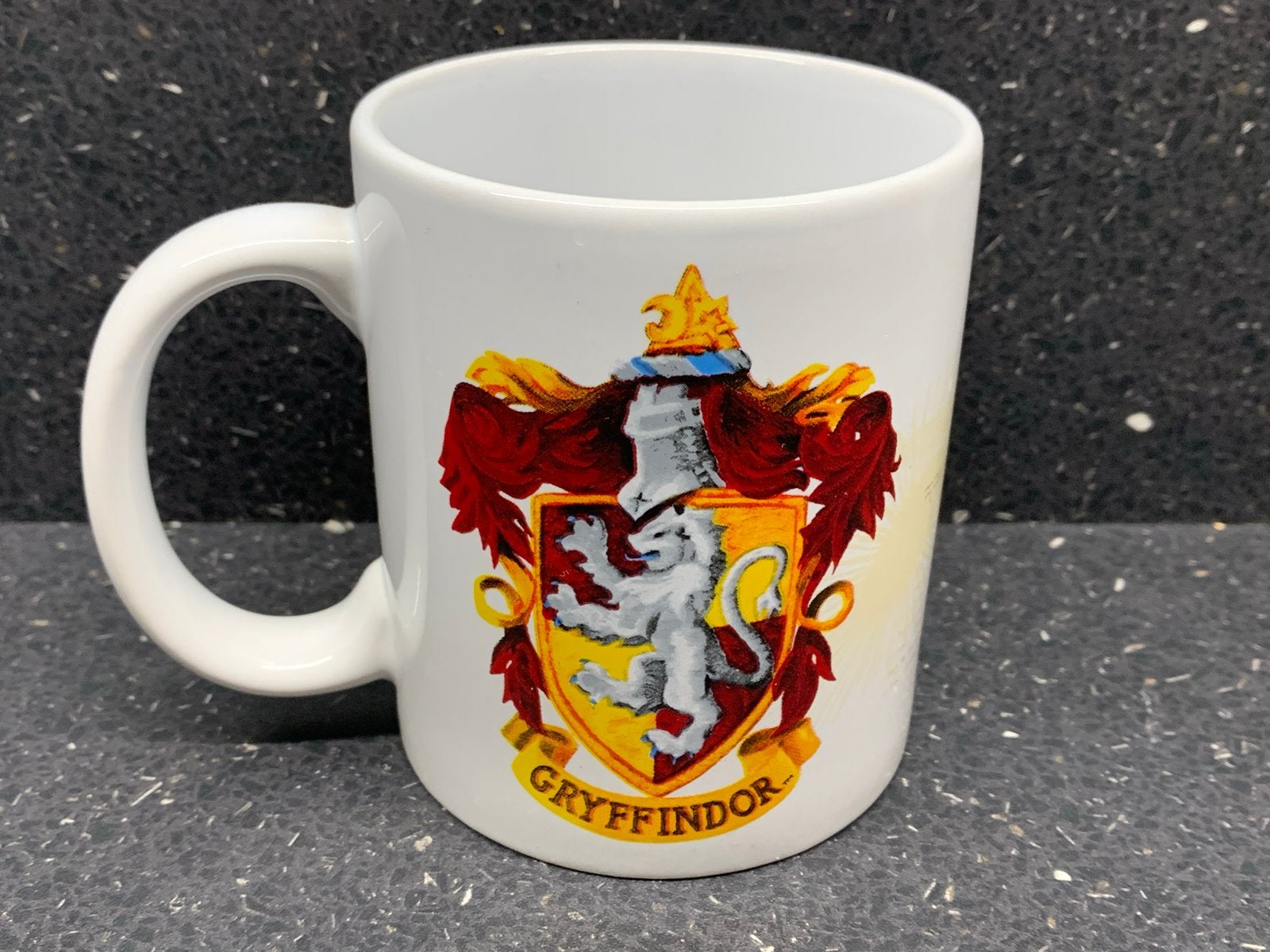 Harry Potter Gryffindor Mok - Zo goed als nieuw, Ophalen of Verzenden, Zo goed als nieuw, Gebruiksvoorwerp