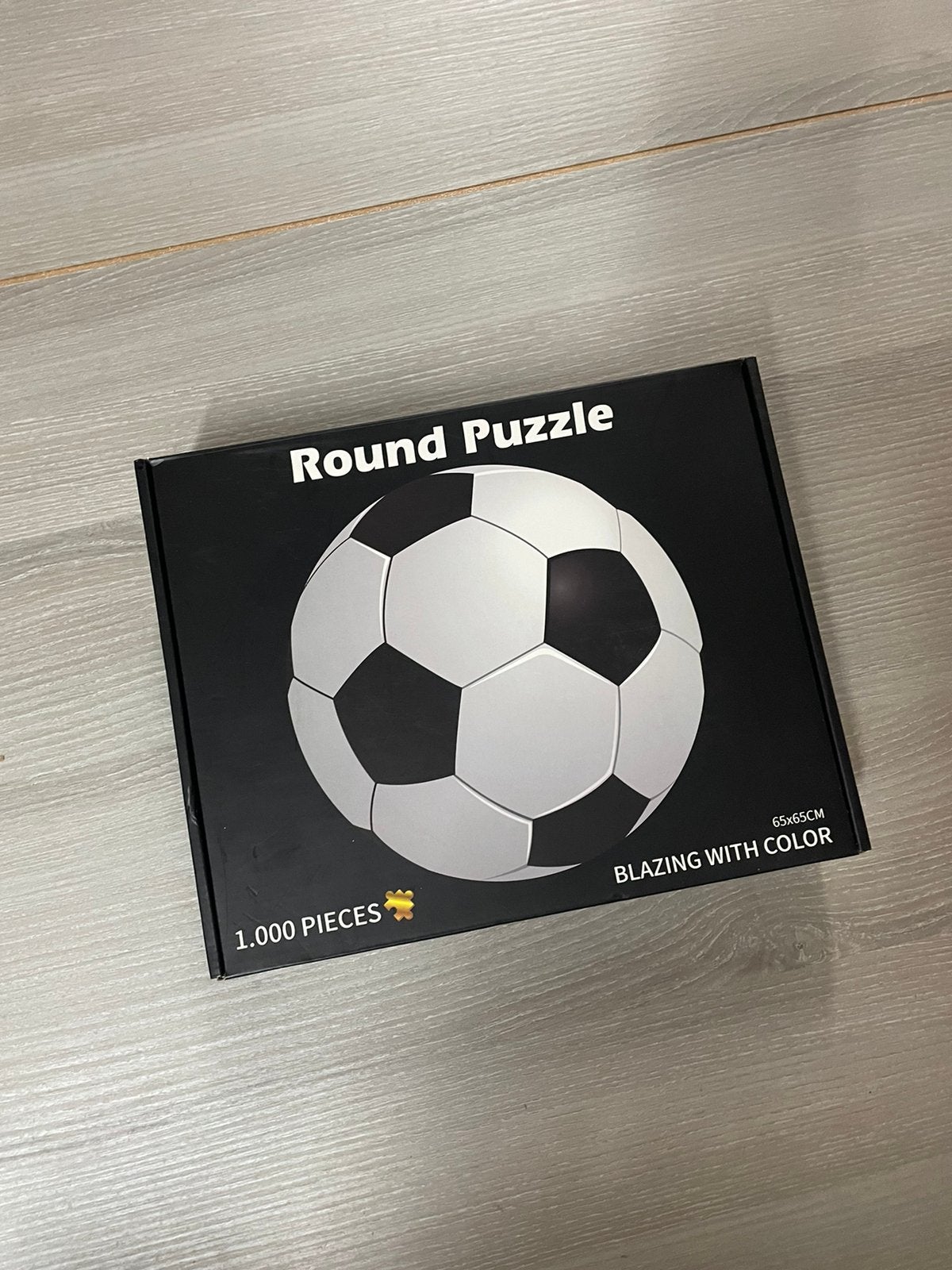 Ronde voetbal puzzel van 1000 stukjes, Ophalen of Verzenden, 500 t/m 1500 stukjes, Nieuw, Legpuzzel