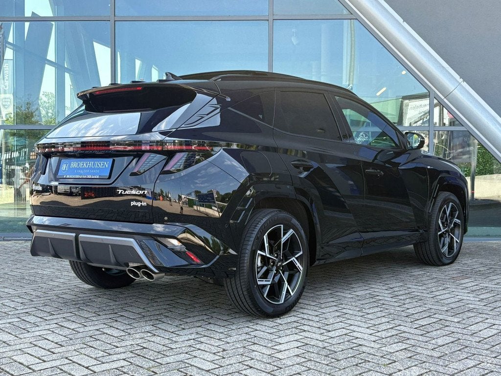 Hyundai Tucson 1.6 T-GDI PHEV N Line Sky Panoramadak / 360 C, Auto's, Hyundai, Zwart, 4 cilinders, Zwart, Bedrijf