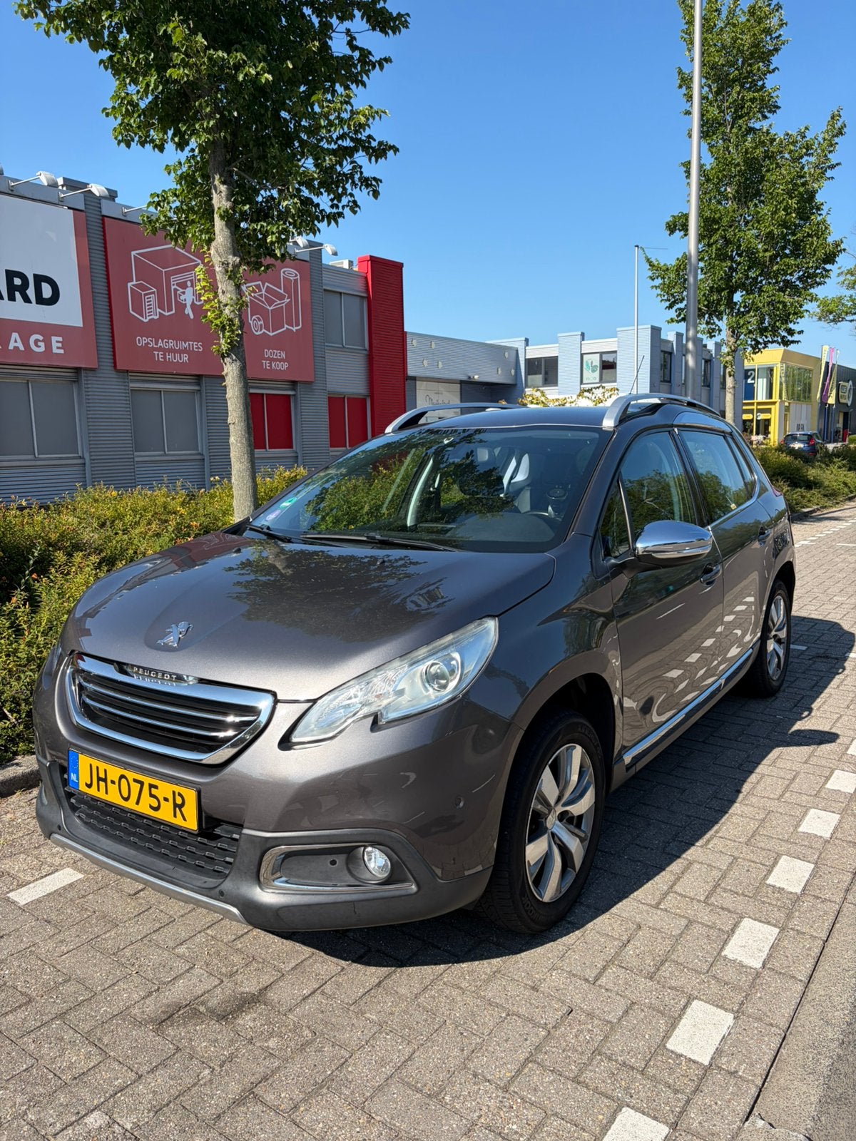 Peugeot 2008 1.2 PureTech 110 PK Allure | Navi | Climate, Auto's, Peugeot, Parkeersensor, Zwart, 1270 kg, Leder en Stof