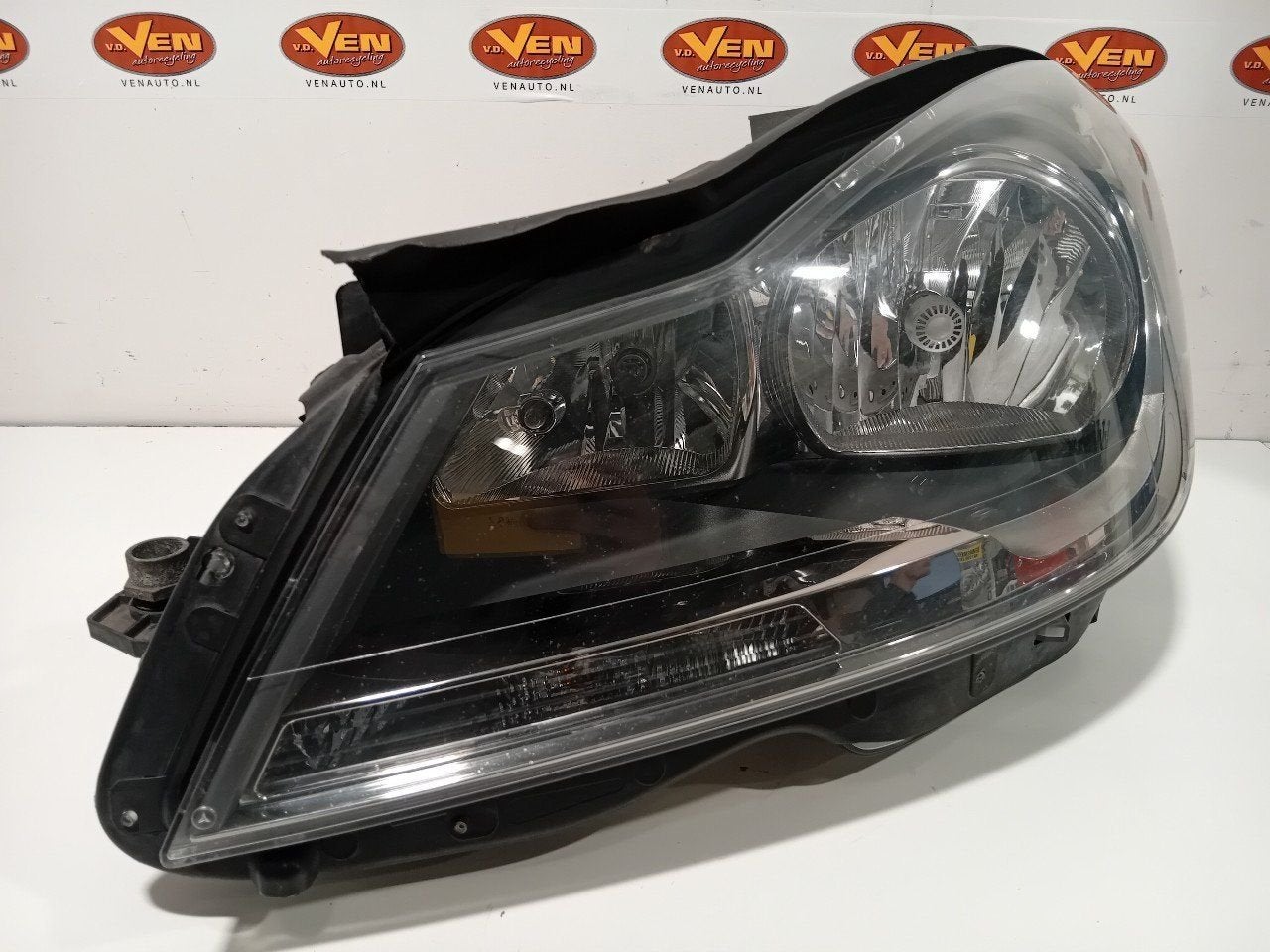 Koplamp links Mercedes-Benz C-Klasse, Onderdelen@venauto.nl, Van der Ven Autorecycling B.V., Gebruikt, Ettenseweg 76, 4706 PB Roosendaal, The Netherlands