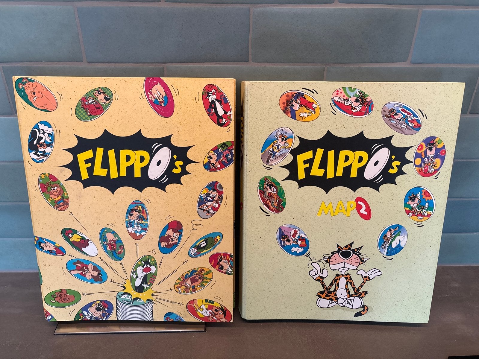 2 complete Flippo mappen met Flippo's, Ophalen of Verzenden, Looney Tunes, Verzameling, Met verzamelmap(pen)