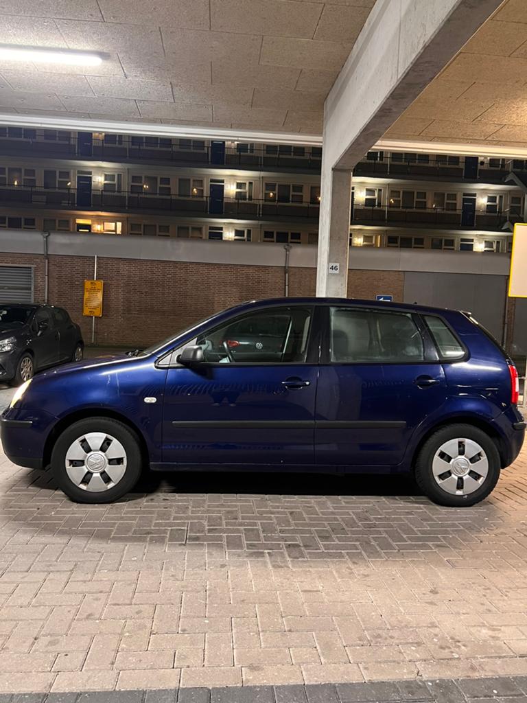 Volkswagen Polo 1.4 55KW 2003 Blauw, Auto's, 4 cilinders, Blauw, Origineel Nederlands, Handgeschakeld