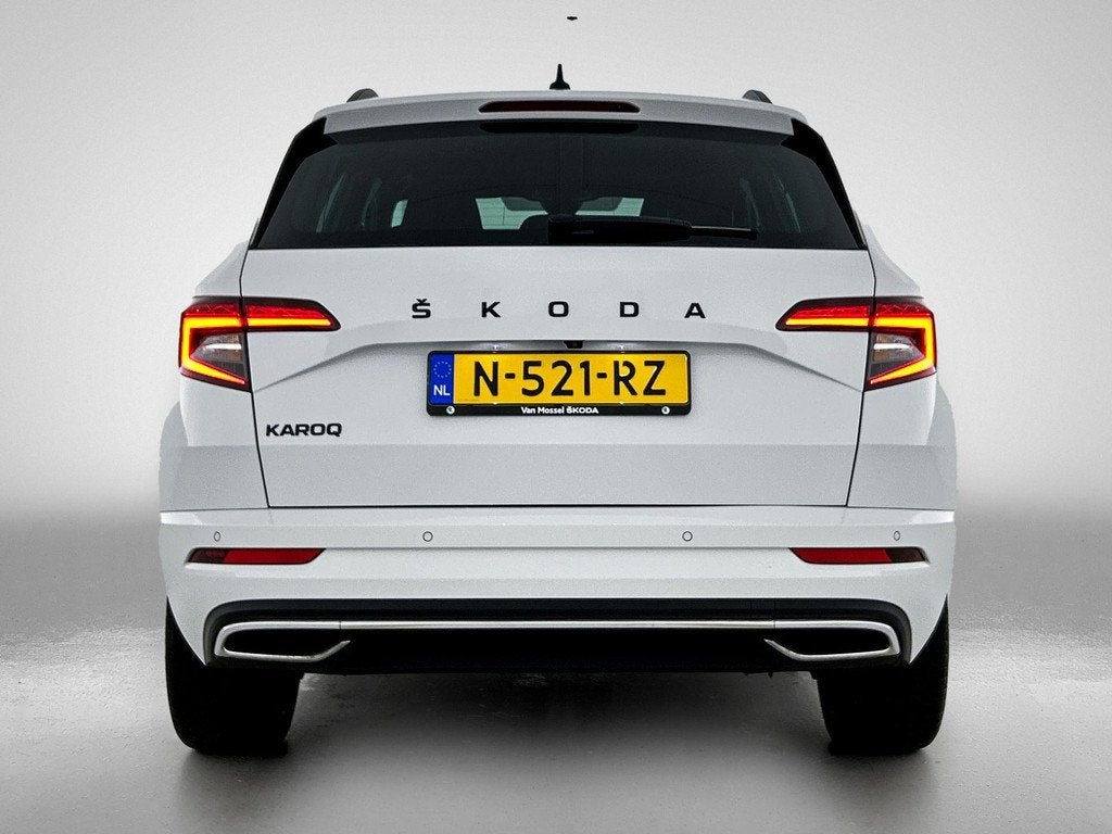Skoda Karoq 1.5 TSI ACT Sportline Business | CANTON | ELEK.A, Auto's, Skoda, 12 maanden, Stof, 4 cilinders, Wit