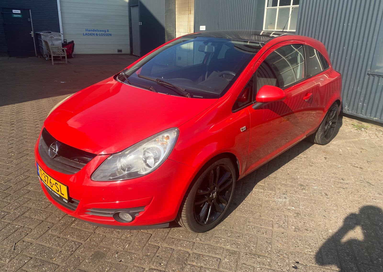Opel Corsa 1.4 Ecotec 64KW 5D 2010 Rood, Auto's, Opel, Particulier, Corsa, Benzine, Hatchback, Handgeschakeld, Geïmporteerd, Rood