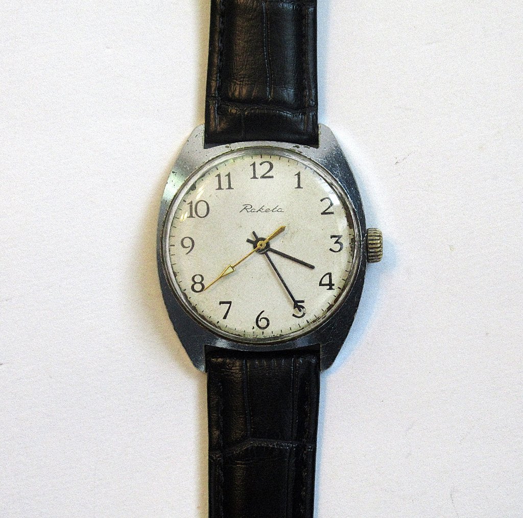 Raketa vintage mechanisch herenhorloge, made in USSR van 80, Ophalen of Verzenden, Leer, Overige merken