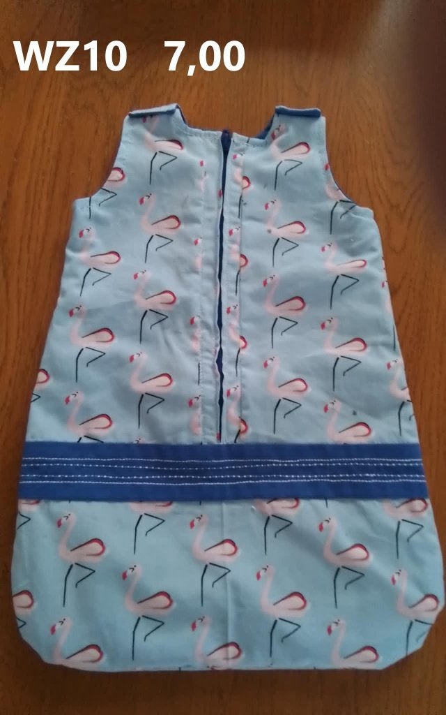 Poppenkleertjes baby born. Slaapzak flamingo.Opbrengst KiKa., Ophalen, Nieuw, Babypop