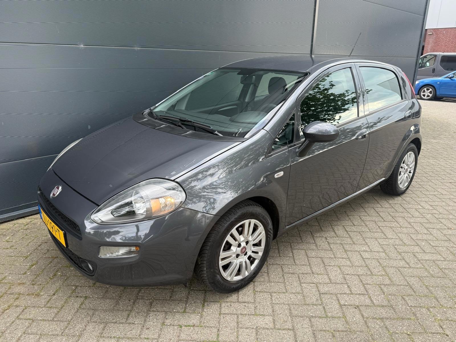 Fiat Punto Evo 0.9 TwinAir Lounge/Airco/cruise/bluetooth/par, Voorwielaandrijving, Gebruikt, Euro 6, 100 pk
