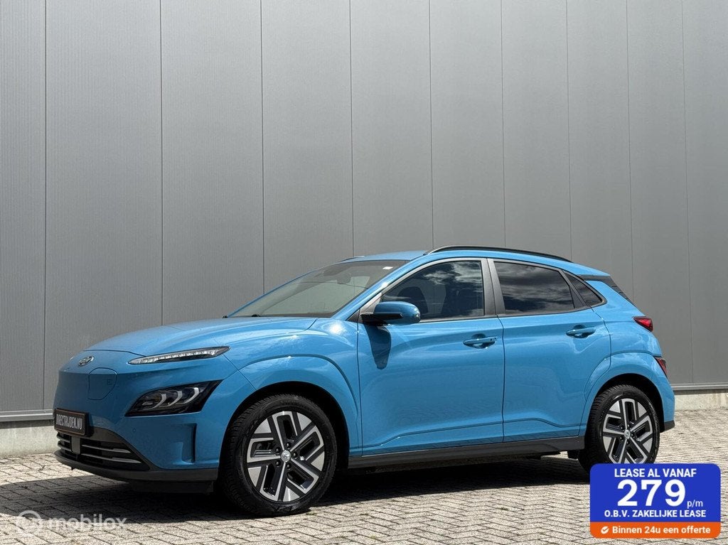 Hyundai Kona EV Fashion 64 kWh | Facelift | SOH 94%, Auto's, Hyundai, Gebruikt, Zwart, Blauw, Leder