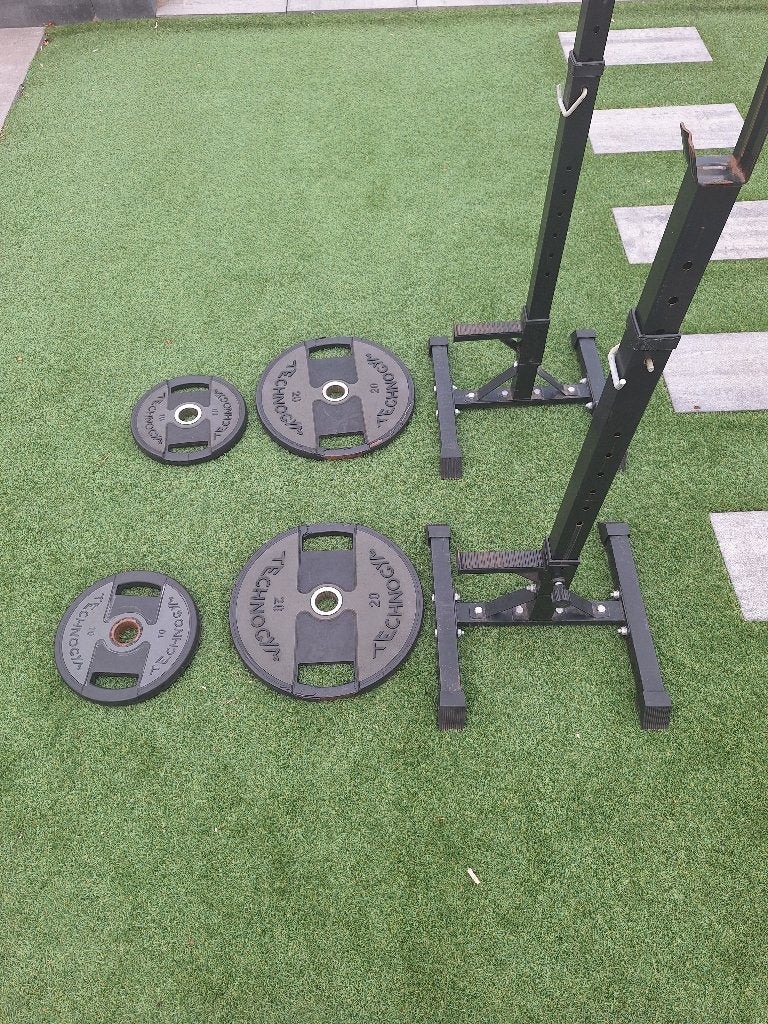 20 & 10kg Technogym schijven + rek, Ophalen, Gebruikt, Rug, Halterschijven