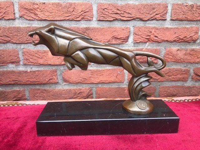 bronzen beeld, springende leeuw, Ophalen of Verzenden, Zo goed als nieuw, Dier